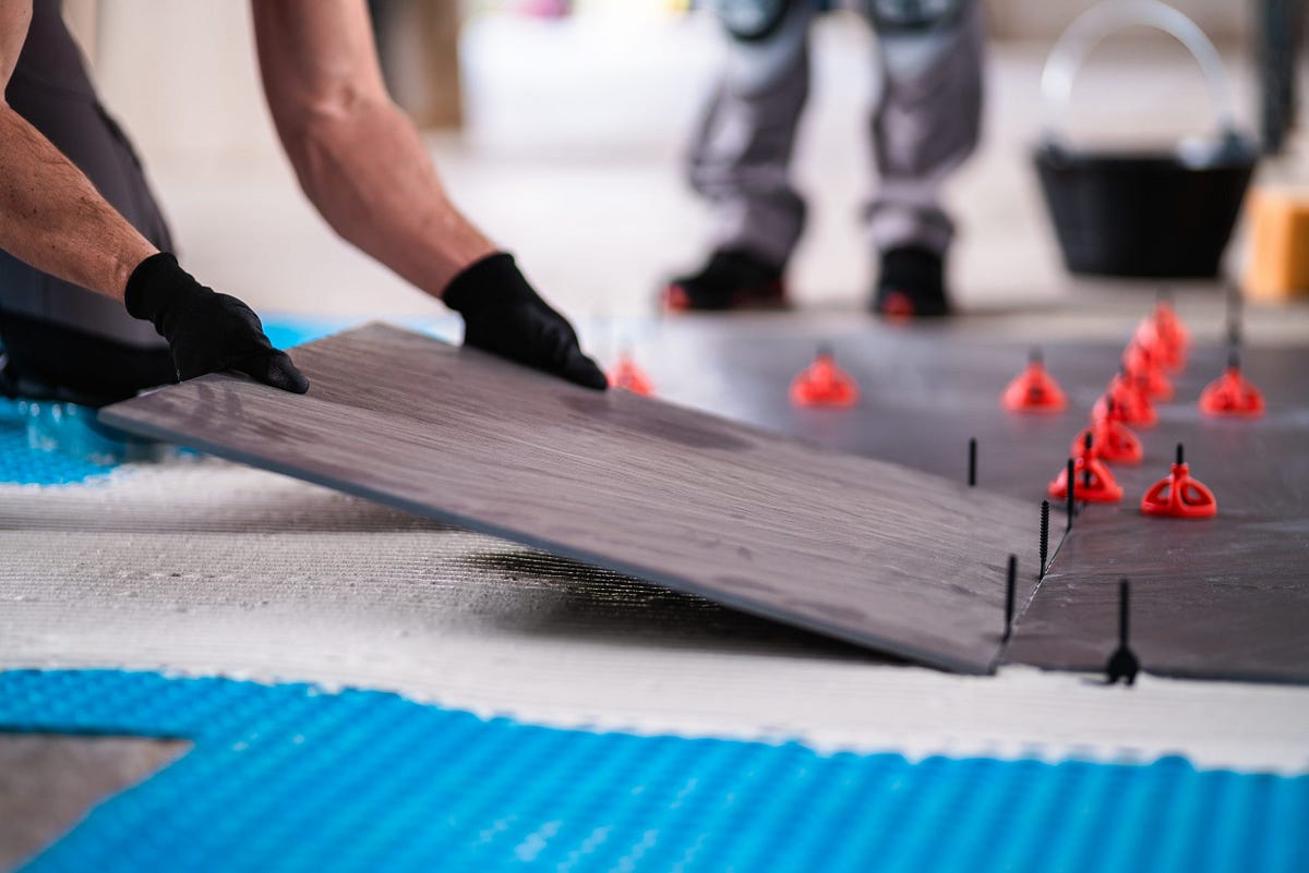 Why Tile Leveling Tools Are Considered Key to Flawless Flooring? | by Acufloor | Jul, 2023 | Medium